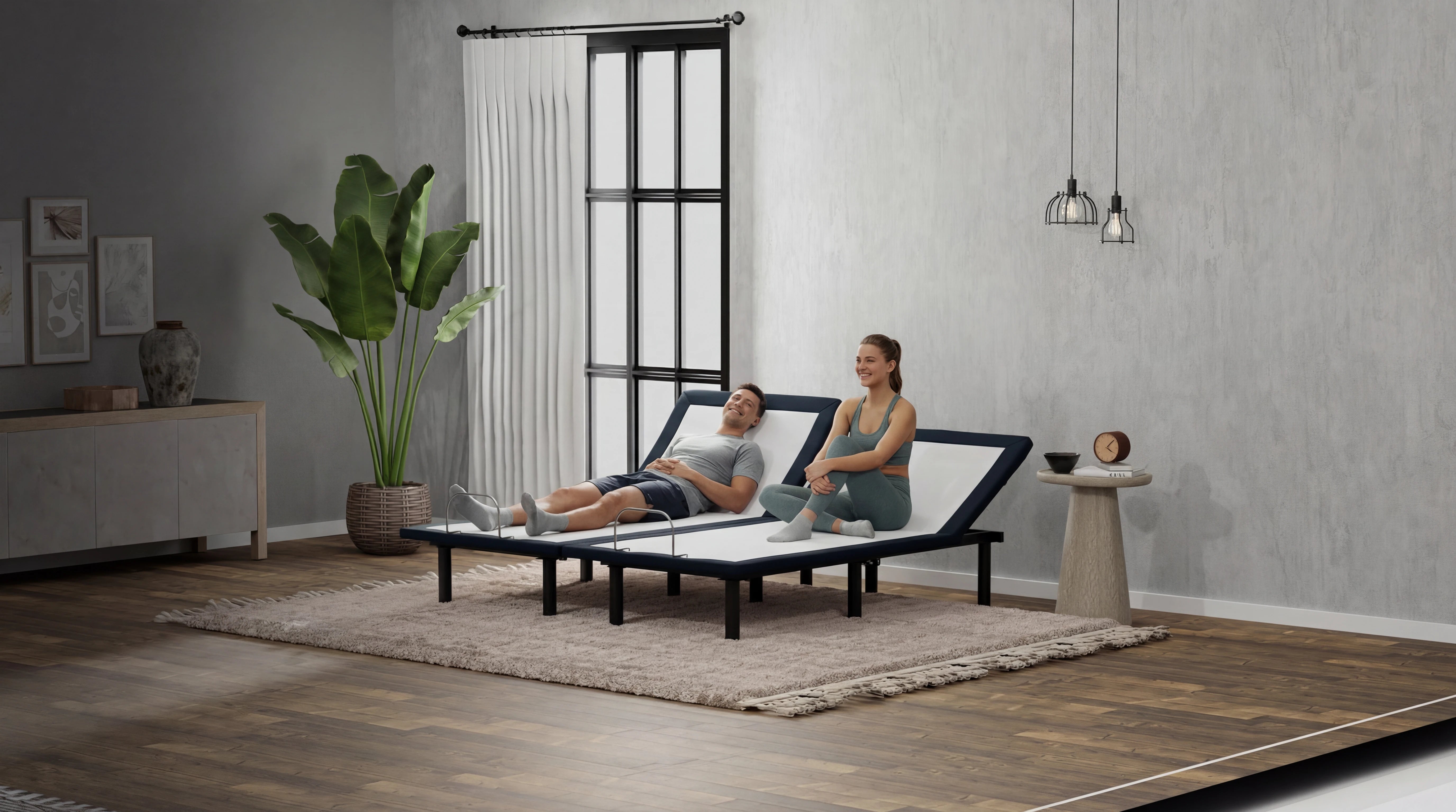 Two people sitting on a modern adjustable bed in a stylish living room.